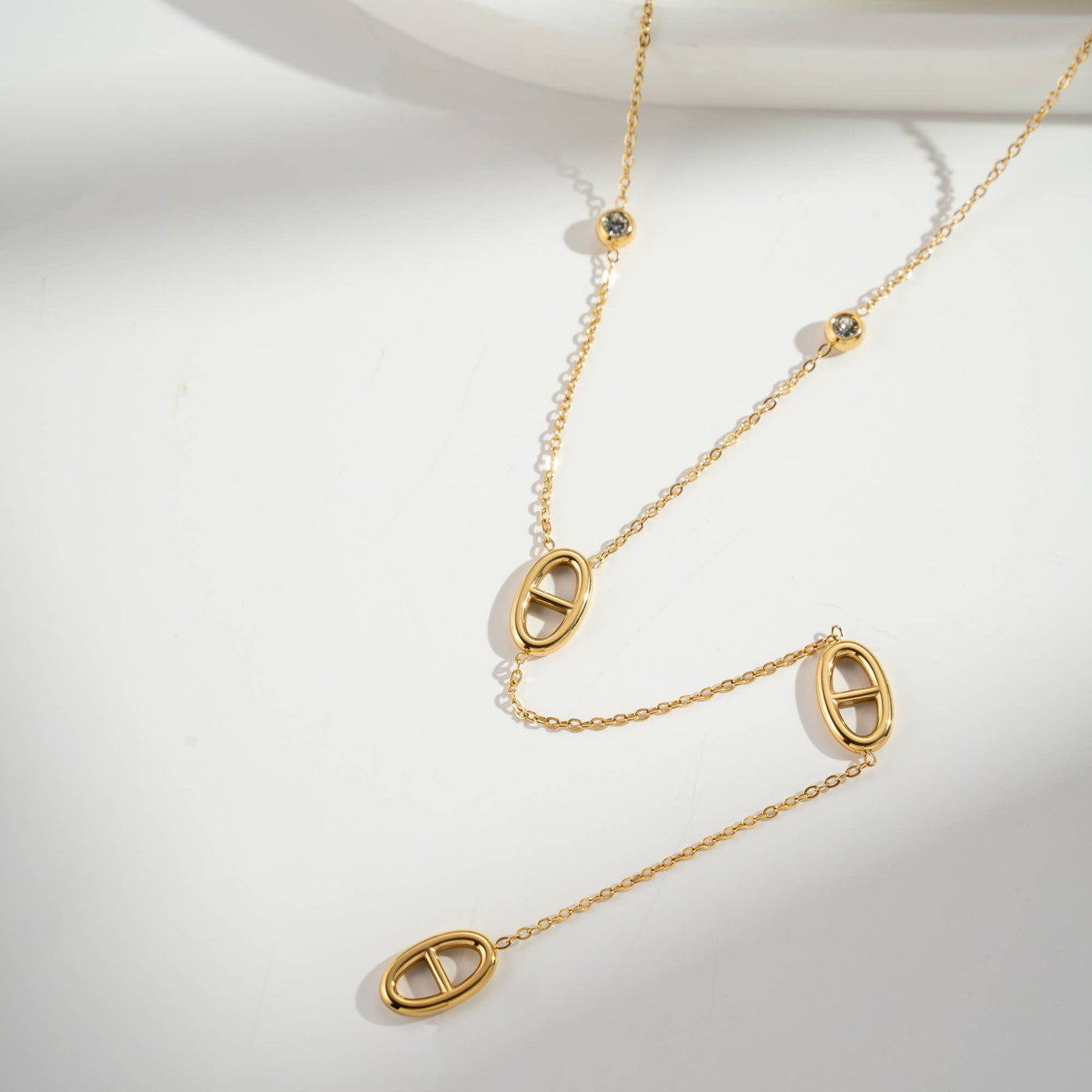 Collier long motif ovale