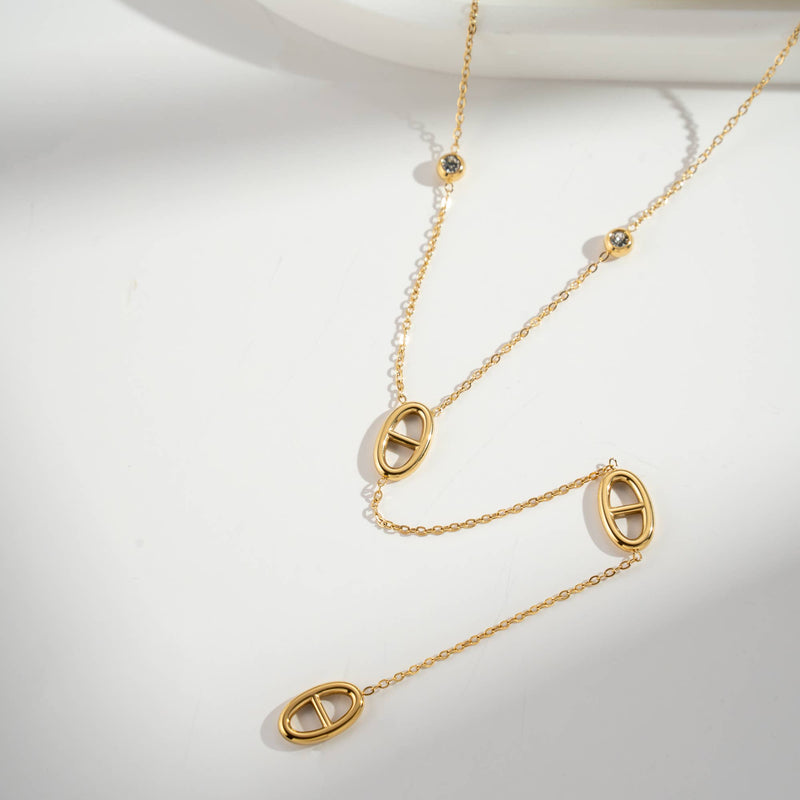 Collier long motif ovale