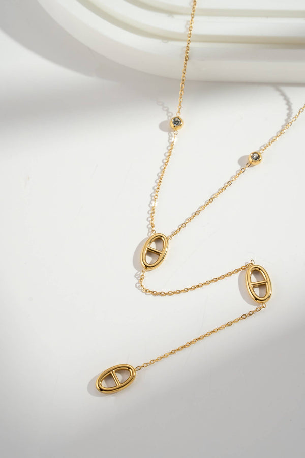 Collier long motif ovale